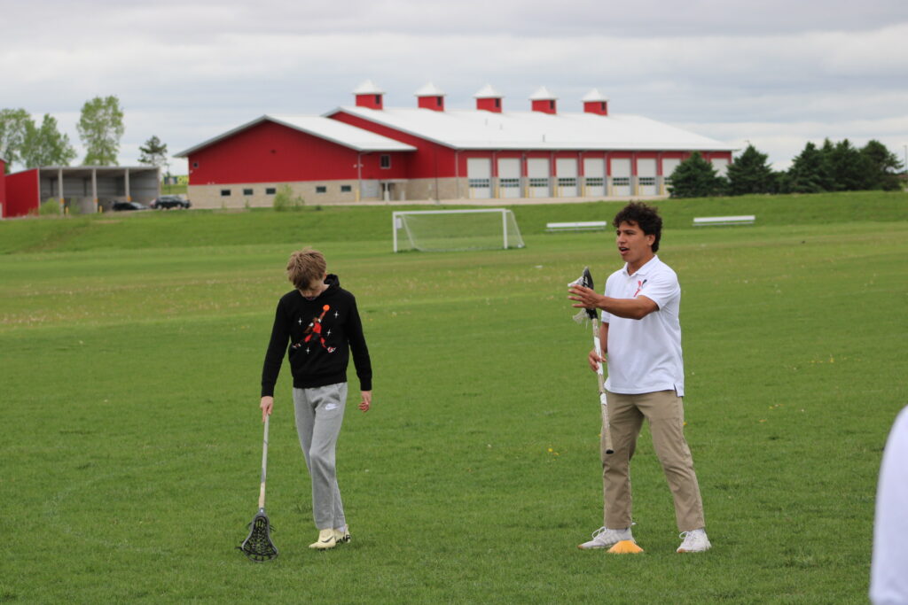 Private Lacrosse Training with Devon Townsend at Athlete’s Field Devon Townsend coaching a private lacrosse session at a local park with a youth player in Wisconsin